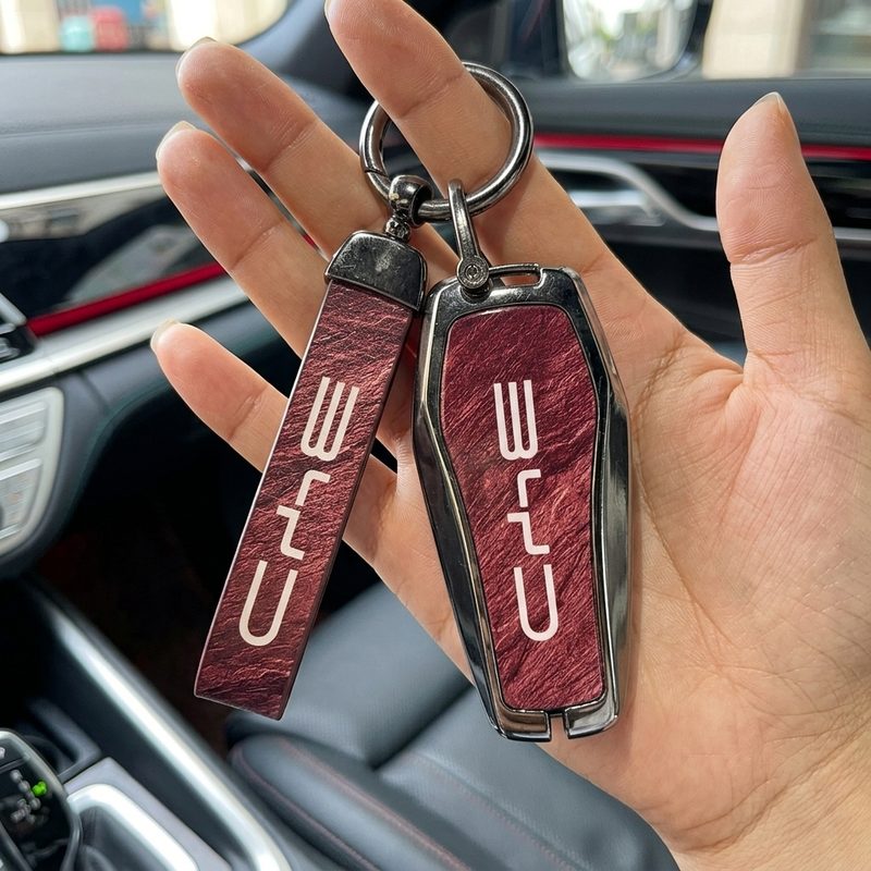 Photo de Hiba — sa coque bordeaux sur sa clé BYD